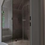 Bath with shower, window, and shelf with towels