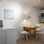 Kitchen with dining area and TV on cabinet
