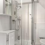 Bathroom with shower, toilet, and sink