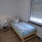 Schlafzimmer 3 mit einem Einzelbett...