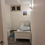 Schlafzimmer 4 mit einem Einzelbett...
