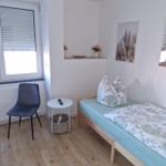 Schlafzimmer 1 mit 2 Einzelbetten...