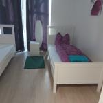 Schlafzimmer 1 mit 2 Einzelbetten...