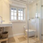 Bathroom with shower, toilet, and sink