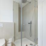 Bathroom with shower and toilet.