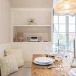 Dining table with chairs and window view