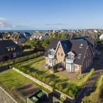 House with garden and view of the North Sea