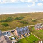 House with garden and view of beach and sea