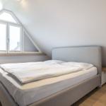 Bedroom with double bed and skylight