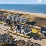 Holiday apartments near the beach with sea and dunes view.