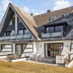 Modern villa with balcony, terrace, and garden. Furnished for vacation.