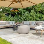 Terrace with seating group, sunshade, and garden lighting.