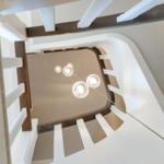 Spiral staircase with modern ceiling lighting