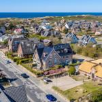 Village with houses and view of the sea