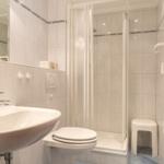 Bathroom with shower, sink and toilet