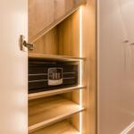 Cabinet with built-in safe and LED lighting.