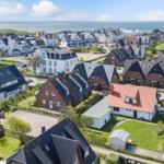 Village with houses and view of the sea