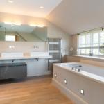 Bathroom with shower, bathtub, and sink