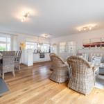 Living and dining area with kitchen and seating