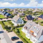 Houses with gardens and sea view