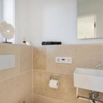 Bathroom with sink, mirror and window