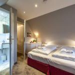 Bedroom with double bed and adjoining bathroom