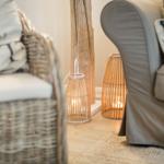 Living room with armchair, baskets, and wooden leg