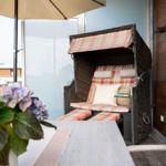 Dachterrasse mit Strandkorb und Meerblick