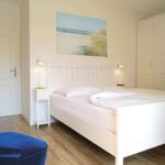 Schlafzimmer mit Doppelbett