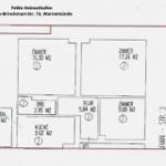 Grundriss zeigt Wohnfläche mit drei Zimmern, Küche, Bad und Flur.