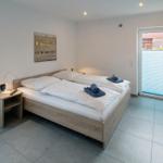 Haus Nordsee-Chalet - Schlafzimmer 1