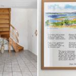 Wooden staircase in white room, wall picture with landscape and text