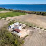House with garden and view of sea and fields
