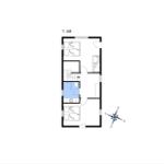 Ground floor plan with bedroom, bathroom, and kitchen.