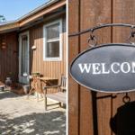 Wooden house with entrance area and welcome sign on the wall