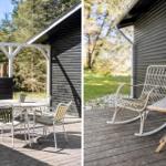 Deck with table and chairs, plus rocking chair with plant.