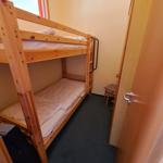 Praktisches Etagenbett im separaten Schlafzimmer – ideal für Familienurlaub auf Fehmarn.