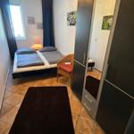 Gemütliches separates Schlafzimmer mit ruhiger Atmosphäre für entspannten Urlaub an der Ostsee.