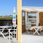Terrace with table, chairs, and umbrella. View of garden and neighboring house.