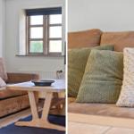 Living room with brown sofa, green and white cushions, wooden table, and window.