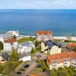 Residenz Ostseestrand und Parkplatz