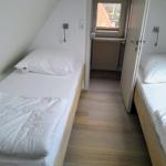 Whg 5
weiteres Schlafzimmer mit 2 Betten (1,90 x 0,9 m) in der Mansarde mit Meerblick und zusätzlicher Toilette