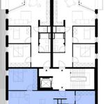 Architekturplan zeigt Räume und Flure mit Treppe und Schlafbereichen.