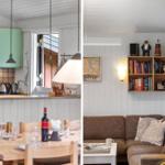 Kitchen with green cabinets and dining area. Living room with sofa, bookshelf, and wall lighting.
