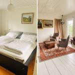 Schlafzimmer mit Doppelbett und Wohnbereich mit Sitzgelegenheiten und Esstisch.