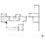 Funktionaler Grundriss mit Küche, Schlafzimmern und überdachter Terrasse.