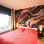 Ferienwohnung am Glockenberg: Schlafzimmer mit Doppelbett 180 x 200