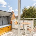 Balkon mit Strandkorb