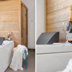 Badewanne mit Champagner und weißen Handtüchern vor Holzwand