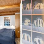 Schlafzimmer mit Holzdecke, Bett und Wandbild mit Füßen.